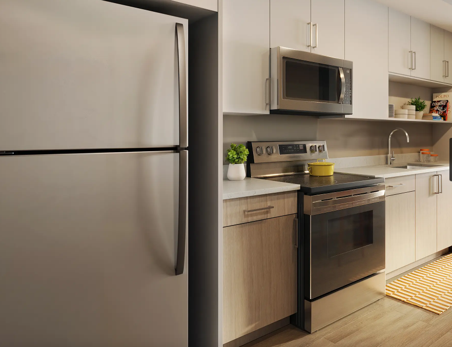 The HUB Tallahassee student housing kitchen with cabinets and countertops